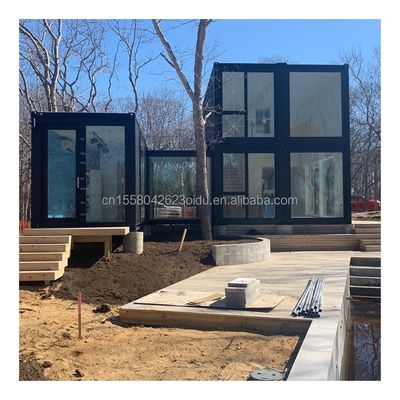 호텔 럭셔리 휴대용 평면 지붕 컨테이너 Prefab 스튜디오 50/75/100mm 파동 샌드위치 패널 벽과 저렴한 가정 집